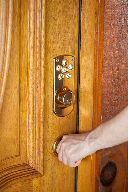 Exterior door that has a keypad lock. تركيب شواحن السيارات في أبوظبي
