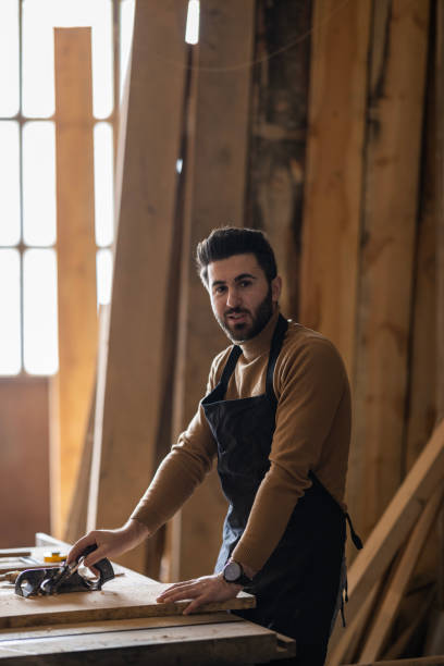 Carpenter working تركيب شواحن السيارات في أبوظبي